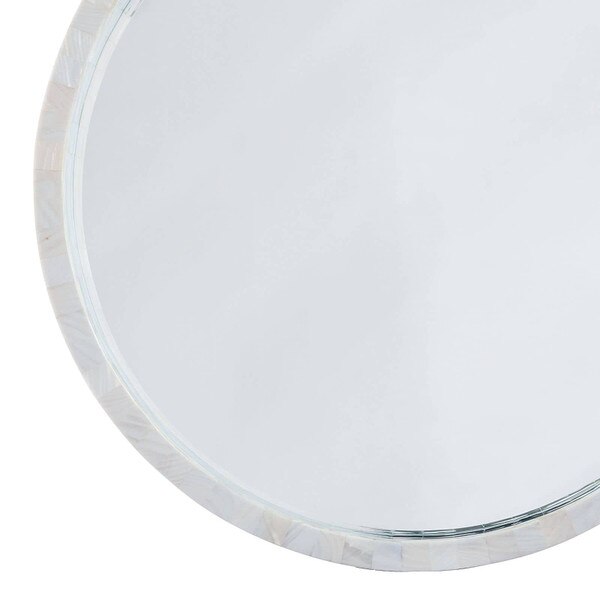 Left side of a Regina Andrew Mother of Pearl Mirror